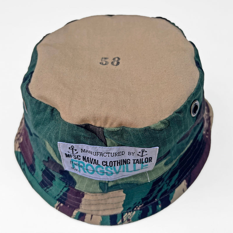 Inspired by vintage military bush hats and local-made boonies, soft crown with stiff/short brim.