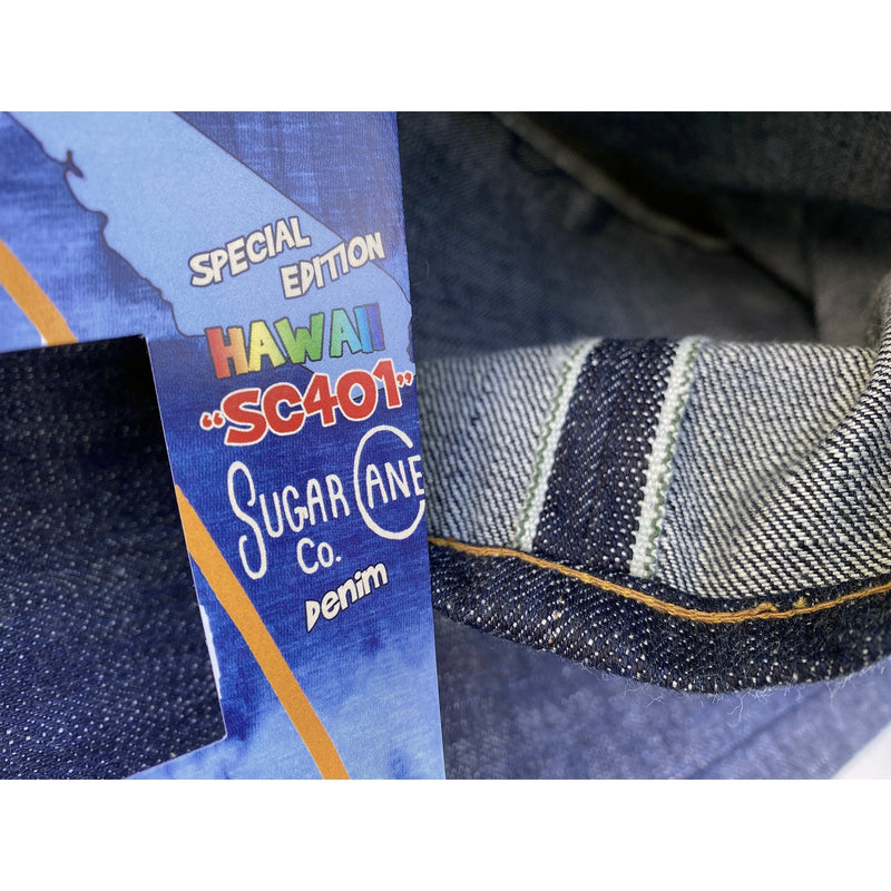 CALIFORNIAN LOT. 674 - "HAWAII" DENIM Sturdy 14 Oz. “401 Hawaii” dark indigo-dyed denim twill, a blend of 50% cotton and 50% recycled sugarcane fibers. White w/ green line selvedge ID. Milled in Japan exclusively for Sugar Cane Co.