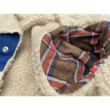 Woven plaid cotton flannel fabric arm lining and Faux shearling fur body lining, 100% acrylic pile fabric, aka “sherpa”.