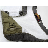 The “M*A*S*H.” edition: White tubular body, contrast gunpowder grey needle-out jersey neckband, OD (Olive Drab) stitching and button placket facing.
