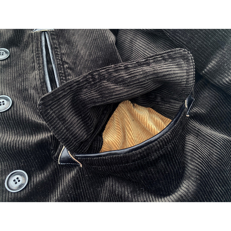 Roamer Car Coat: Black tea-core leather piping on pocket opening and arrowhead reinforcement pocket stops.