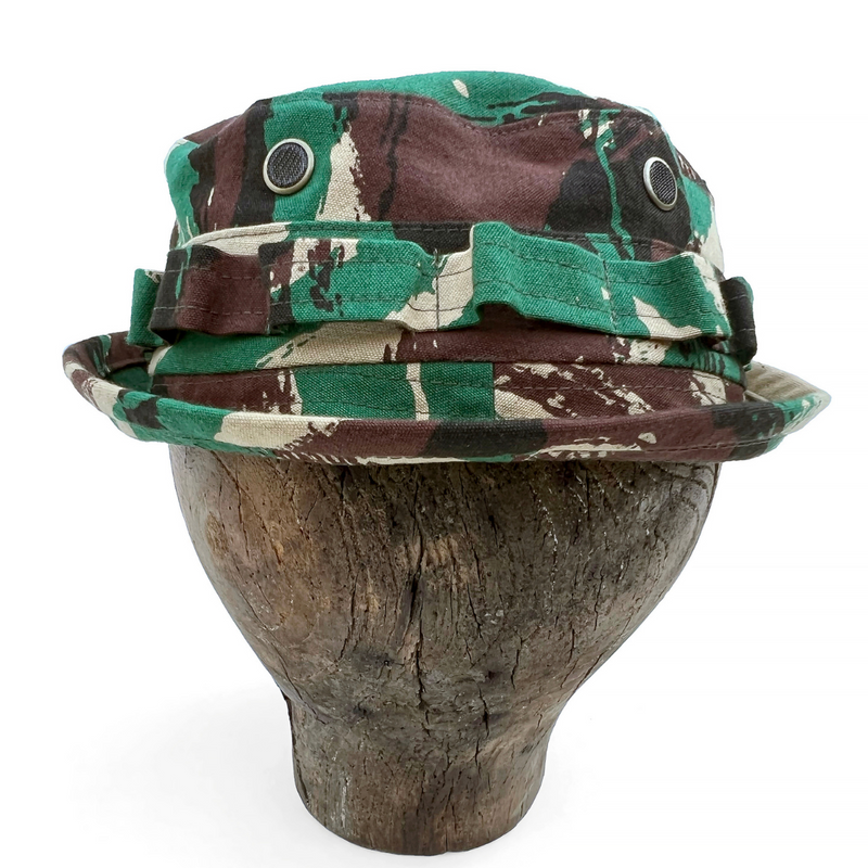 Inspired by vintage military bush hats and local-made boonies, soft crown with stiff/short brim.